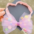 Rosa elastisches Baby-Stirnband mit großer Netzschleife und bunten Pompons gefüllt - Lila Stirnband