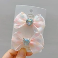Detail van roze polkadot haarspeldjes met hartvormige strass steentjes voor meisjes - Roze Haarclip