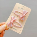 Set di due fermagli per capelli con fiocco scozzese rosa per bambine su carta - Rosa