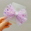 Detail of purple mesh hair bow clip with gold stars and elegant white pearls decoration - Purple