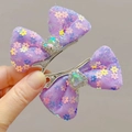 Set di due fermagli per capelli a fiocco in rete viola con paillettes e cuore di cristallo - Viola