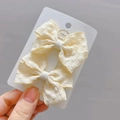 Juego de dos pinzas para el cabello con lazo de tela amarillo pálido para niñas - Pinza para el cabello / Pinza Beige