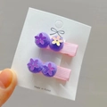 Detail of sequin flower hair clip with purple pompom for kids on a pink ribbon duckbill clip - Medium Purple Style
