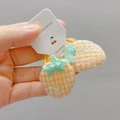 Détail des chouchous ananas à paillettes faits main sur carte de présentation blanche - Chouchou Orange