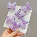 Détail de 6 barrettes papillon brodées violettes avec paillettes et chaîne de perles - Violet