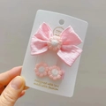 Pink fabric bow hair clip set with daisy flower details on display card for girls - Pink Jewelry Set