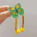 Glitzernde Schmetterling Haarspange mit Pailletten, goldenen Quasten und gelben Bommeln - Gold Grüner Schmetterling