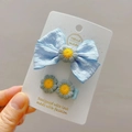 Blue fabric bow and embroidered daisy hair clips set on a display card - Blue Set