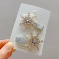 Paire de barrettes flocon de neige scintillantes pour filles avec strass centraux - Argenté