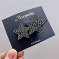 Detailed close-up of sparkling rhinestone star hair clips on a black card - Rock Gray Star Duo Hair Clip