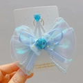 Macro detail of a light blue organza butterfly hair clip with glitter and sequins - Light Blue (Heart)