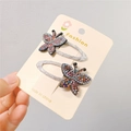Close-up of sparkling colorful crystal butterfly hair clips in a two-piece set for kids - Butterfly Design