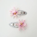 Detail of pink snowflake hair clips with silver glitter bows and jingle bells for girls - Pink Bell Snowflake Pair