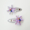 Detail of purple glitter snowflake hair clips with colorful bells and ribbon bows - Purple Bell Snowflake Pair
