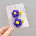 Pair of purple plush flower hair clips with yellow centers on a white display card - Dark Purple Duckbill Clip