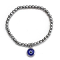 Detail shot of hematite beaded bracelet with blue evil eye pendant on white background - Dark Blue Round Pendant (BE1351SR07)