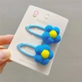 Pair of blue plush flower snap hair clips with yellow centers for young girls - Lake Blue BB Clip