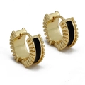 Detailed view of vintage gold C-shape hoop earrings with black enamel and ribbed texture - Black