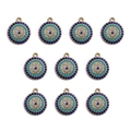Dettaglio di dieci ciondoli occhio blu per creazione gioielli con base dorata - BT693GD03