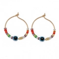 Detail of gold hoop earrings with colorful glass seed beads and evil eye charm - Multicolor Seed Beads Style (BE1374GD08)