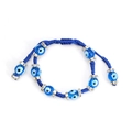 Macro detail of hand-woven blue Evil Eye bracelet with sparkling rhinestone-set alloy beads - Light Blue