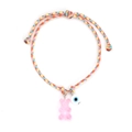 Detail von rosa Gummibär und Evil Eye Anhänger an bunt gewebtem verstellbarem Armband - Rosa