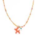 Détail du collier perlé avec pendentif chien ballon en résine orange et œil protecteur - Orange