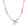 Detail of colorful beads and evil eye charms on this handmade bohemian necklace - Pink Double Eye Style (BE1422PK00)