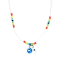 Detail of colorful beaded necklace featuring white rice beads and blue evil eye charms - White Double Eye Style (BE1422WH00)