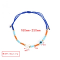 Detail of adjustable blue woven evil eye bracelet with heart charm and colorful beads - Blue Rope Heart Pendant Style (BE1427MI15)