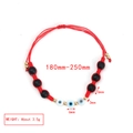 Detailed view of adjustable evil eye bracelet with red cord and lava beads, size 180-250mm - Red Rope Black Lava Beads Style (BE1427MI17)