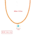 Detail showing orange beaded necklace with 14mm evil eye pendant and size dimensions - Orange Small Beads With Round Evil Eye Pendant Necklace (BE1448MI06)