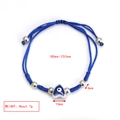 Detail of adjustable blue braided rope bracelet with silver beads and evil eye heart charm - Heart Style (BE1480BU15)