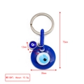 Blue evil eye keychain pendant with golden horseshoe and round sapphire resin charm - Dark Blue Eye Disc Style (BE1363BU23)