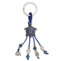 Dettaglio portachiavi a tartaruga con occhio del male e ciondolo mano di fatima - Blu/Argento
