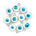 Macro detail of silver plated evil eye charms with blue enamel for DIY jewelry making - White (BE1682WH00)