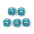 Macro shot of turquoise cube beads with evil eye pattern for DIY jewelry making - Evil Eye Style (TEY6108LBU00) / 5 Pieces / Lake Blue