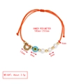 Verstellbares orangefarbenes Armband mit goldenem Hufeisen und blauem Auge-Anhänger - Orange-Hufeisen Anhänger (BE1695OR03)