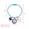 Türkiser Stahldraht-Armreif mit blauen bösen Augen-Anhängern und einer Barockperle - Türkis Stahldraht Armband Zirkon Rundes Auge Perle Stil (BE1443LBU01)