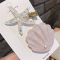 Detailansicht der Seestern- und Muschel-Haarspangen aus Kunstharz mit Perlen und Glitzer - Seestern und Muschel Stile / Rosa und Weiß
