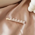 Detail shot of vintage French style pearl hair clip on elegant champagne silk fabric - Double Row Pearl Elegant Hair Clip (AB-28-11)
