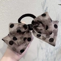 Detail of grey polka dot organza bow scrunchie showing semi-transparent fabric texture - Coffee Hair Tie