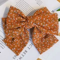 Orangefarbene Haarklammer mit blau-weißem Blumenmuster aus Stoff für Damen - Orange