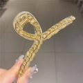 Detalle de pinza para el pelo grande transparente con cadena metálica dorada incrustada - Transparente