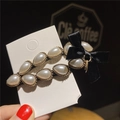 Elegant teardrop pearl hair clip with gold trim and a black silk bow accessory - Waterdrop BB Clip