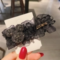 Detail of black lace hair clip with rhinestone mouse shape and gold Love me metal charm - Lace Cartoon