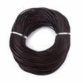 Macro view of 2mm dark brown round leather cord roll for DIY jewelry weaving crafts - 1.5mm / Coffee