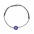 Detail of adjustable black woven rope bracelet with blue evil eye bead and silver charm - Black
