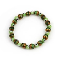 Detail shot of Evil Eye beaded bracelet with green and bronze textured beads on white background - Green