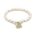 Bracelet en perles d'eau douce avec breloque œil bleu protecteur et finition dorée - Style Mauvais Œil avec Strass Baguette (BE72GD05)
